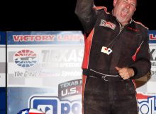FORT WORTH, TX - SEPTEMBER 17: Troy Taylor, driver of the #56 Limited Modified class celebrates after winning the Port-A-Cool U.S. National Dirt Track Championship at Texas Motor Speedway on September 17, 2011 in Fort Worth, Texas. (Photo by Sean Gardner/Getty Images for TMS).